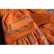 Närbild på gummiförstärkningar på handryggen – designade för rekylskydd och slagmotstånd.