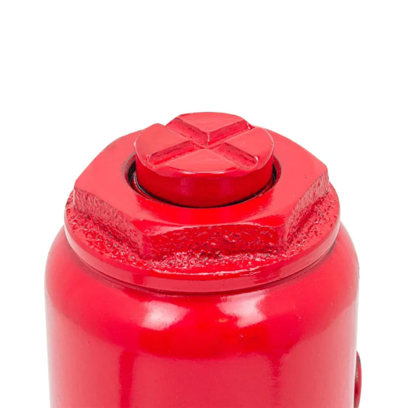 Hydraulisk flaskdomkraft med pumphandtag.
