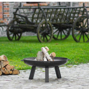 Cook King POLO eldfat med ved – uteplats med gammaldags vagn i bakgrunden