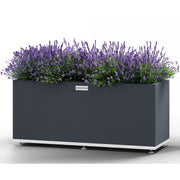 Rektangulär stålkruka från Coyotto med justerbara fötter – stilren design för offentlig och privat utemiljö.